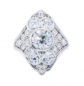 Edwardian platinum statement ring set with diamonds.