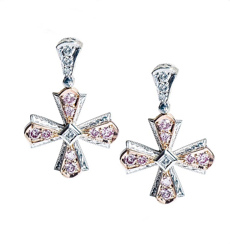 White gold earrings set with pink and white diamonds.