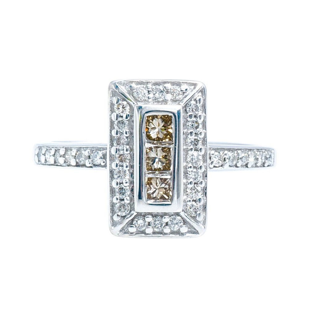 White gold engagement ring centered with light brown diamonds, a white diamonds
rectangle halo, and white diamonds in the band.