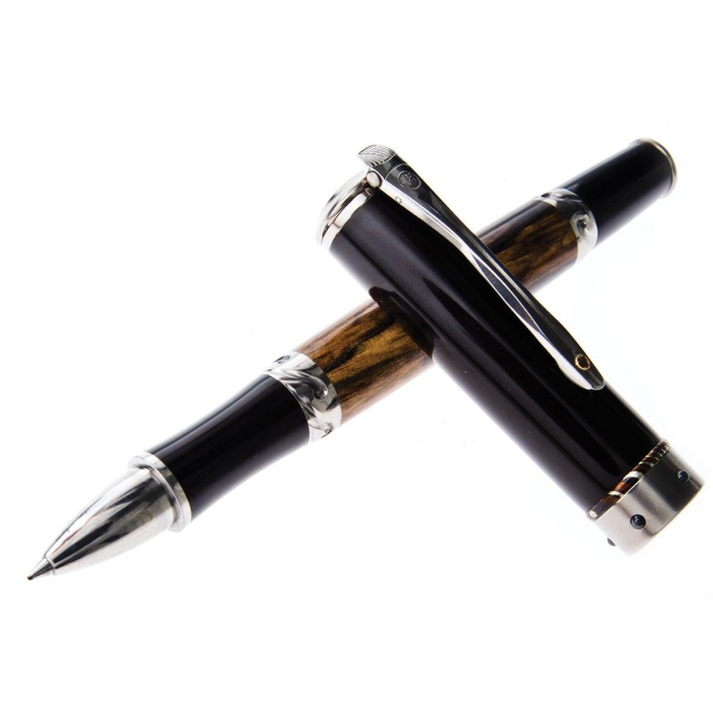 Vintage titanium and aluminum William Henry Cabernet RBS-11 pen with Mokume and
ebonite accents, ebony barrel, smoky quartz accents and stainless-steel pocket clip.