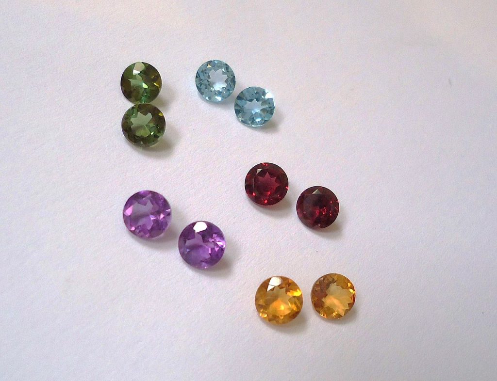 Loose cut precious gemstones.