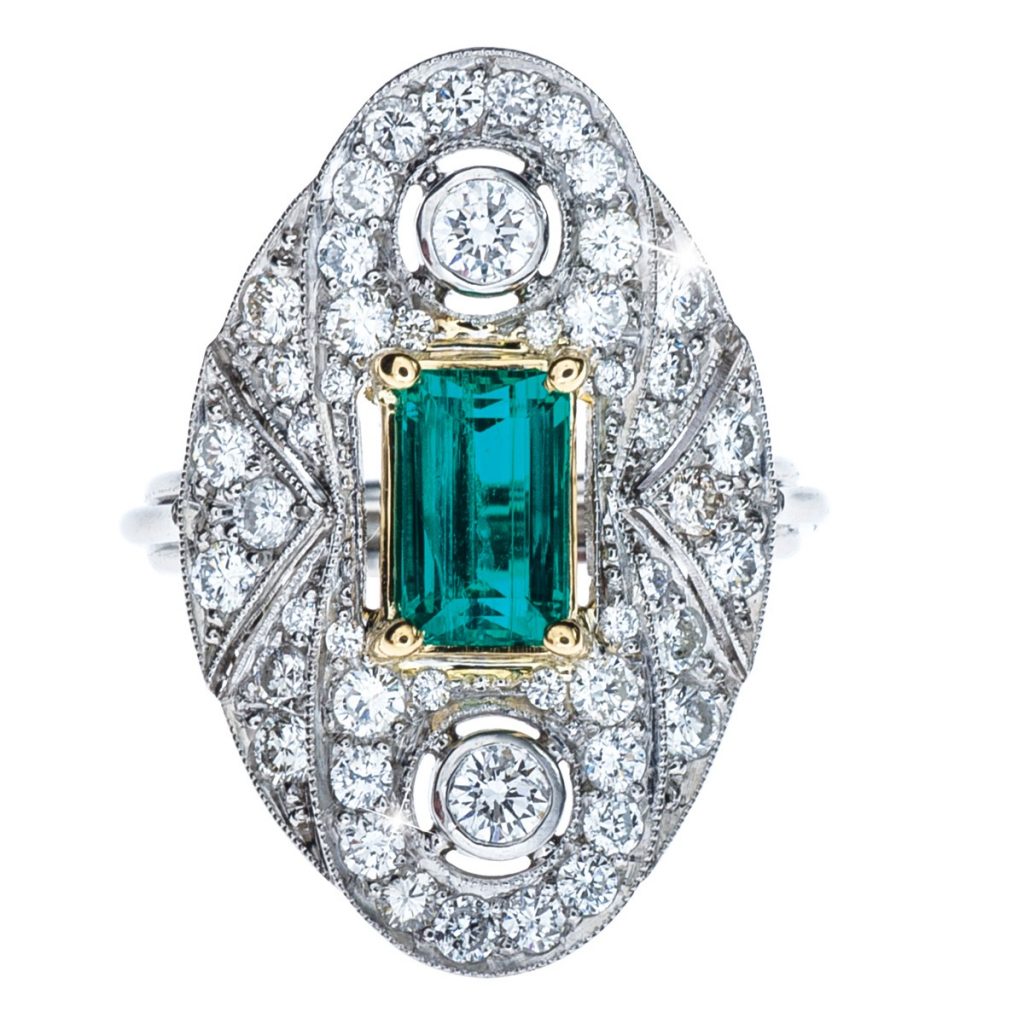 Emerald colored gemstone ring