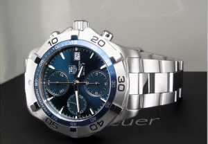 Pre-owned men’s TAG Heuer Aquaracer in stainless steel with a blue dial.