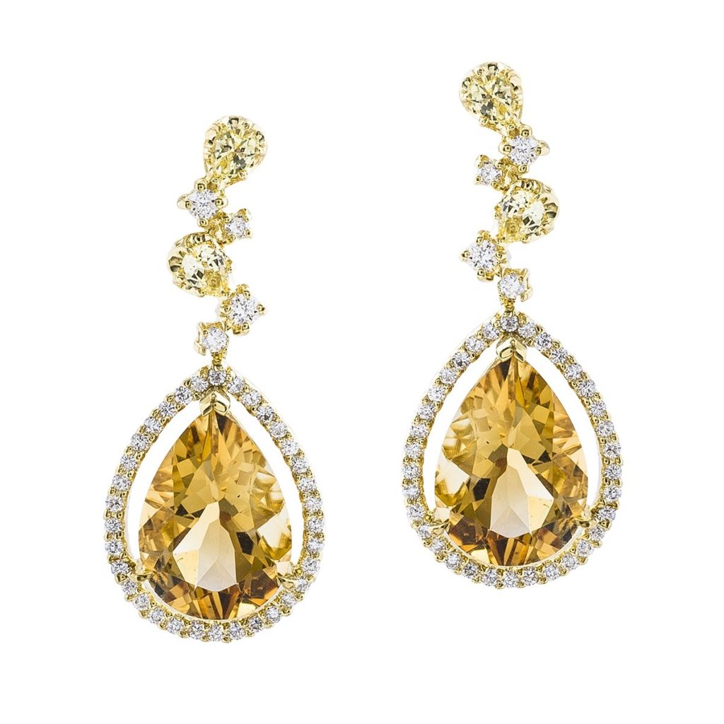 White and yellow gold drop earrings set with citrine and diamond haloes.