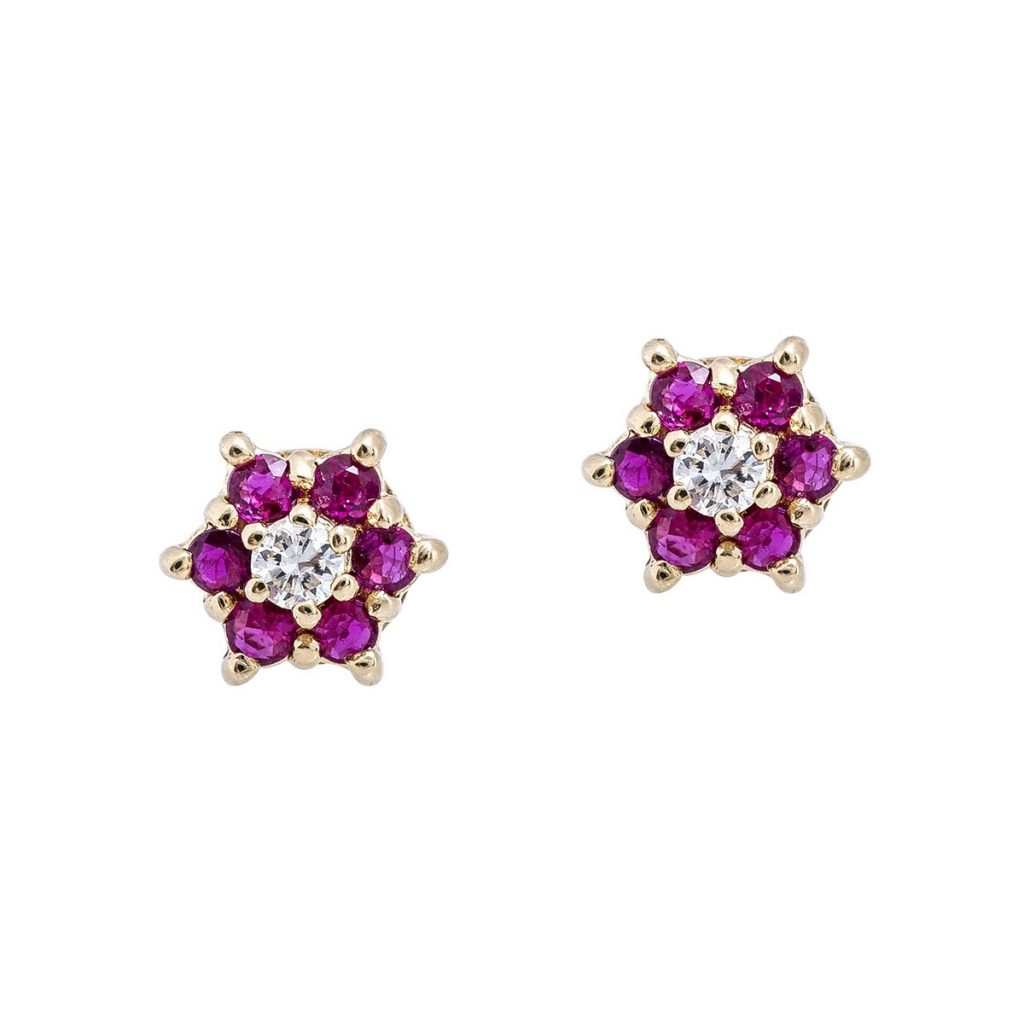 Yellow gold flower stud earrings set with rubies and diamonds.