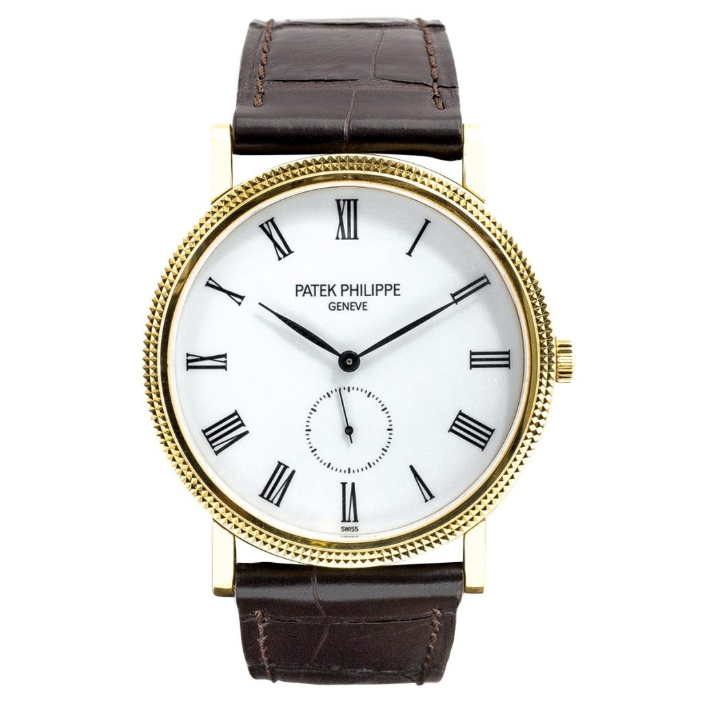 Pre-owned men’s Patek Philippe in yellow gold with white roman numeral dial and
brown leather strap.