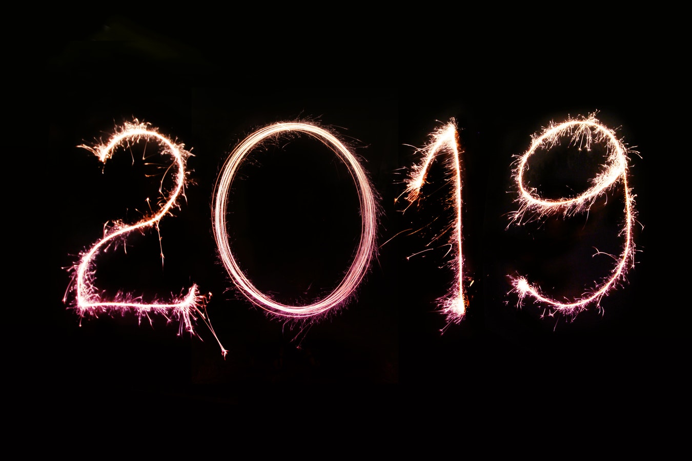 Black background with neon text “2019”.