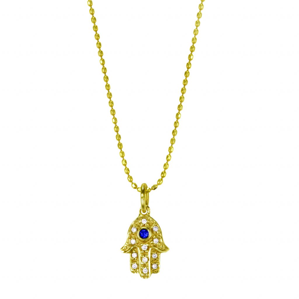 Yellow gold Hamsa pendant set with sapphire and diamonds.