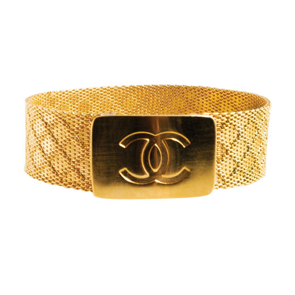 Vintage gold tone Chanel logo mesh bracelet.