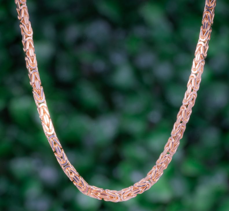 Yellow gold byzantine chain.