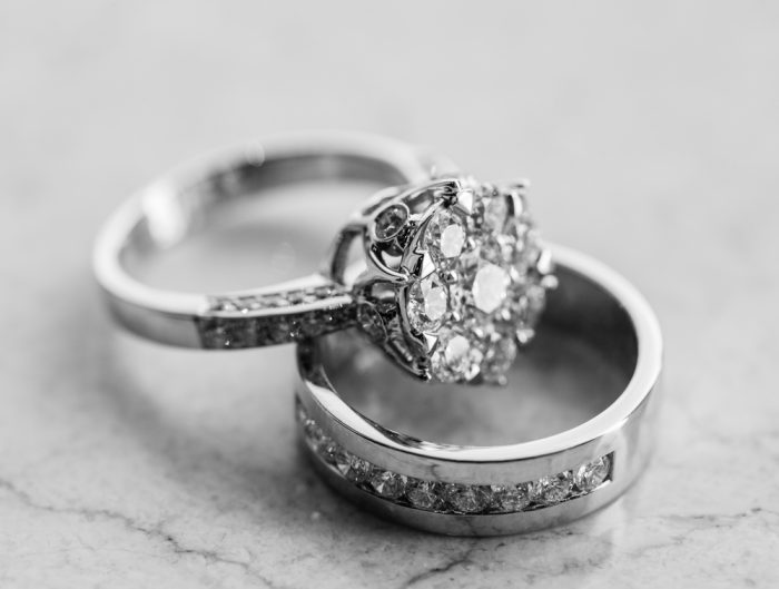 White gold wedding band and solitaire diamond engagement ring.