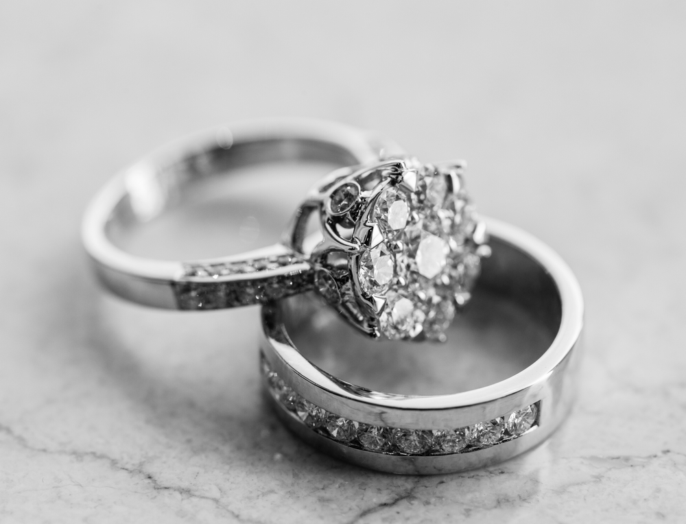 White gold wedding band and solitaire diamond engagement ring.