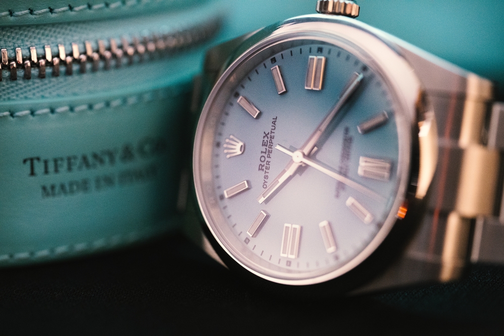 Stainless steel Tiffany & Co. Rolex with a blue dial.