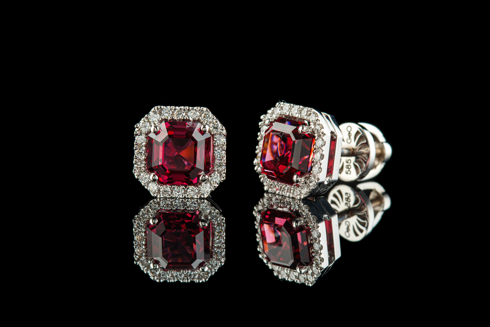 square cut garnet and diamond stud earrings.