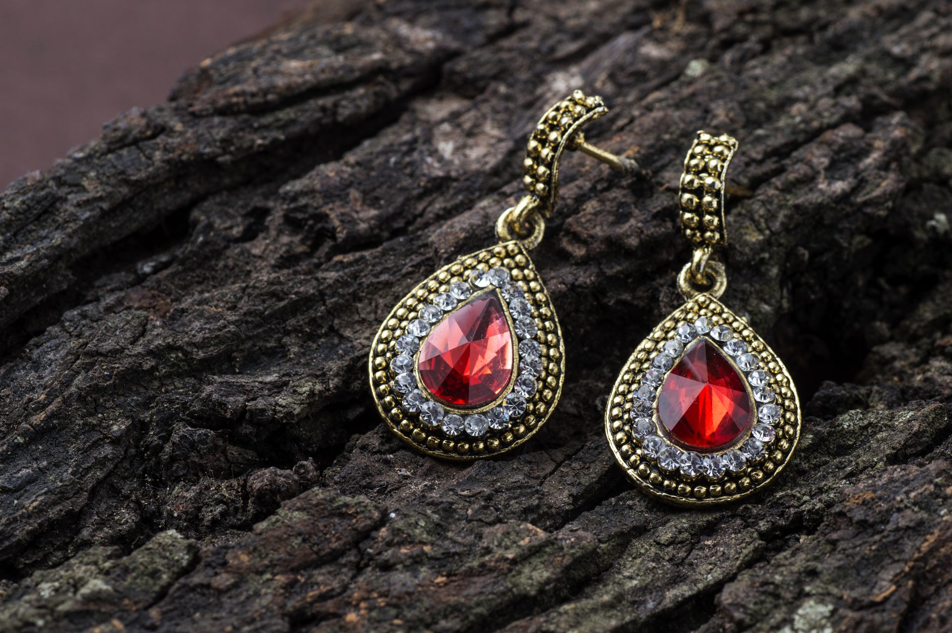 pear shaped ruby & diamond halo earrings