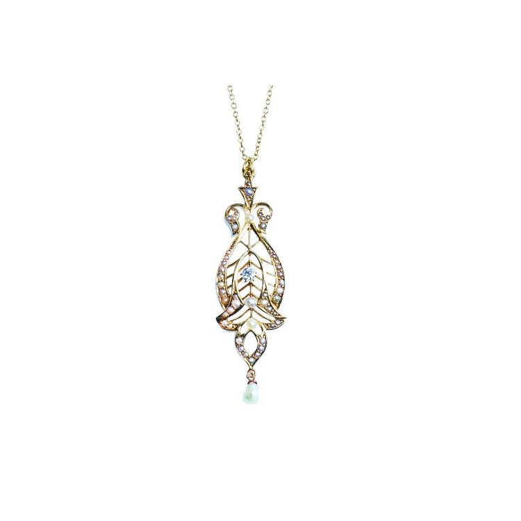 Elegant gold pendant necklace with intricate design, studded with small gems and a pearl drop at the bottom.