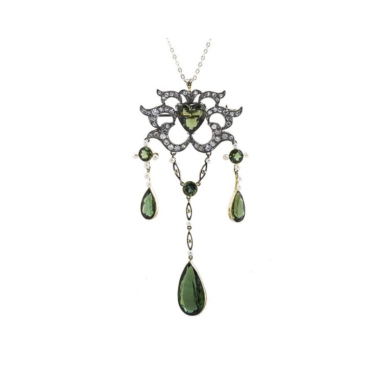 a moldavite drop pendant with multiple pear shaped drops