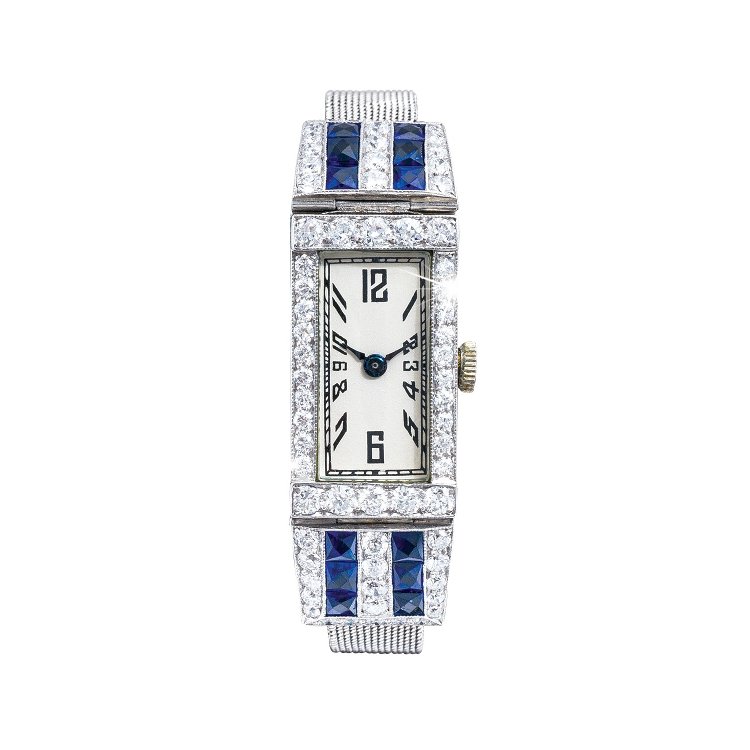 art deco high jewelry watch with diamonds and blue sapphires