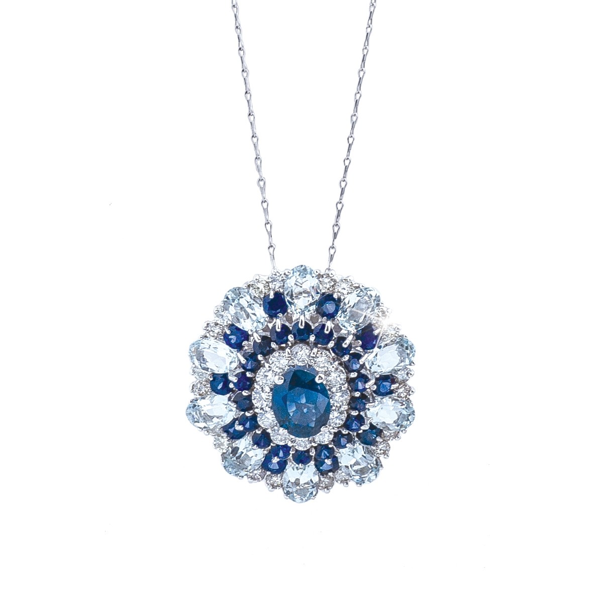 an alternating sapphire and diamond pendant necklace