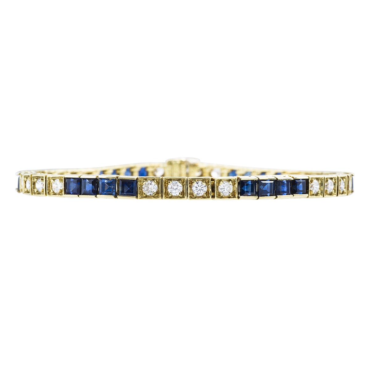 a diamond and sapphire tennis bracelet 