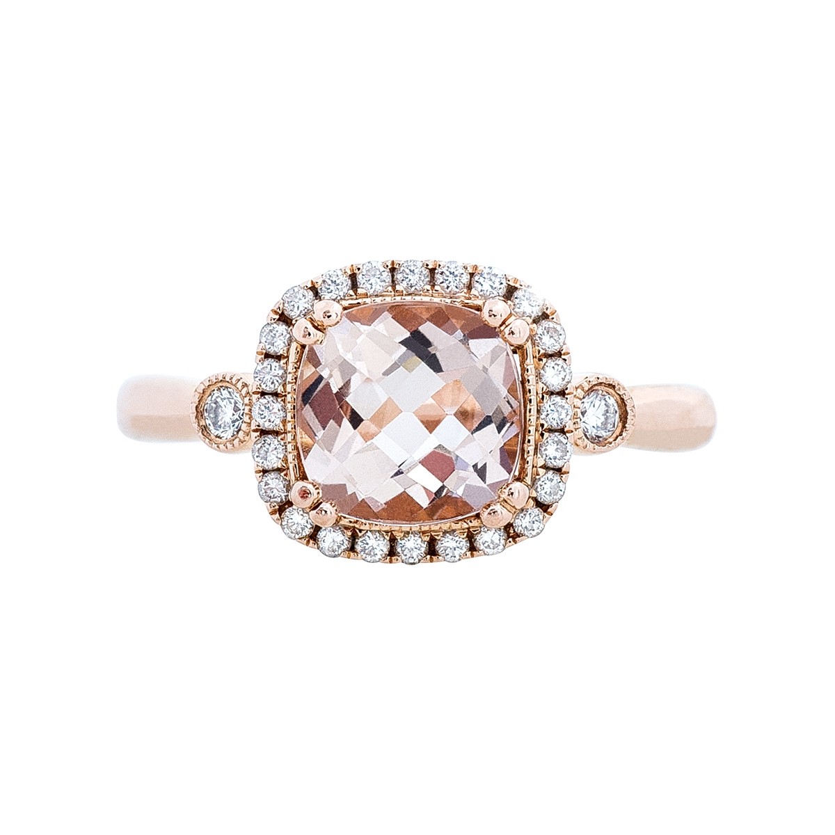 rose gold ring set with a cushion diamond and diamond halo