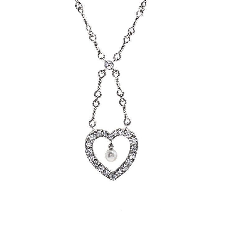 a diamond open heart drop pendant