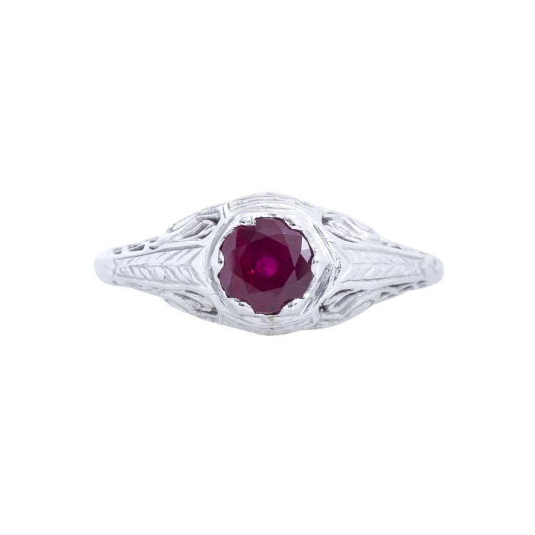 ruby solitaire ring set in engraved white gold