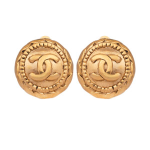 gold tone chanel clip on earrigns, round with the chanel logo on the front