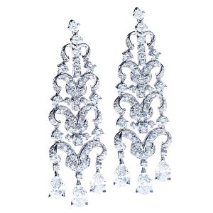 A pair of elegant diamond earrings, showcasing their brilliance and intricate design, perfect for any formal occasion.