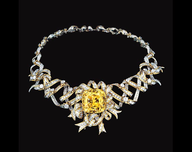 Vintage yellow and white gold Tiffany & Co. Schlumberger Ribbon Rosette necklacecentered with the Tiffany Yellow Diamond.