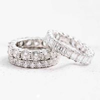 Elegant diamond eternity rings with round and baguette-cut diamonds set in white gold