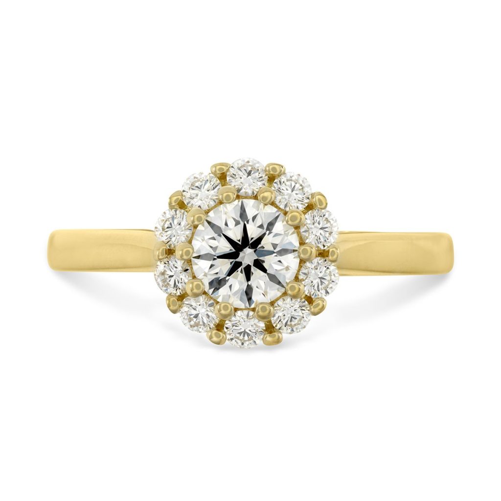 Yellow gold diamond engagement ring with diamond halo.