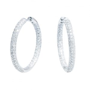 Two elegant diamond hoop earrings crafted in white gold, showcasing a refined and luxurious design.