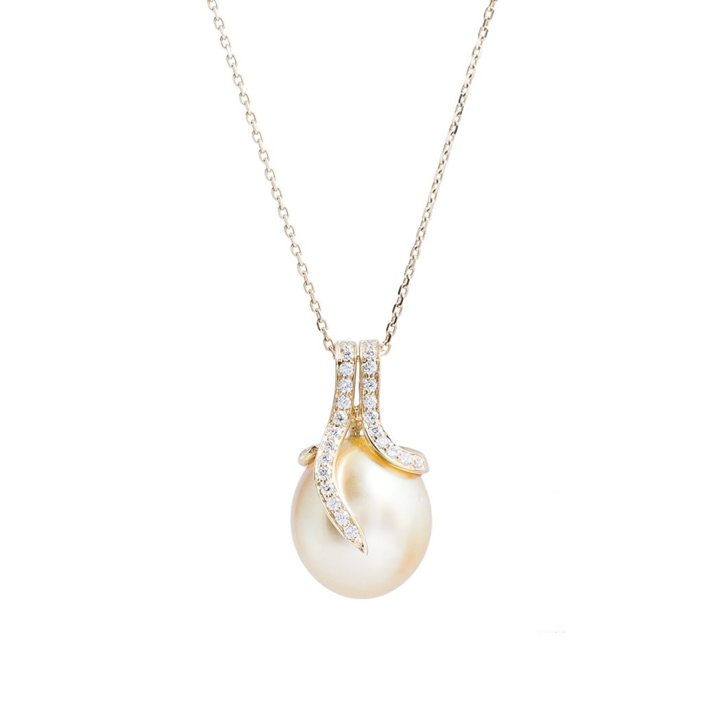 image of golden pearl pendant