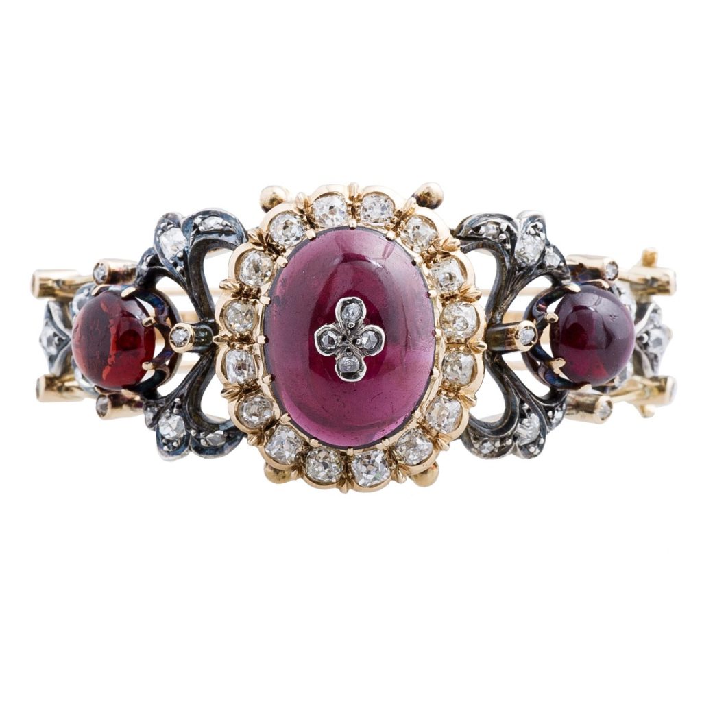 Victorian ring set with gemstones and diamonds.