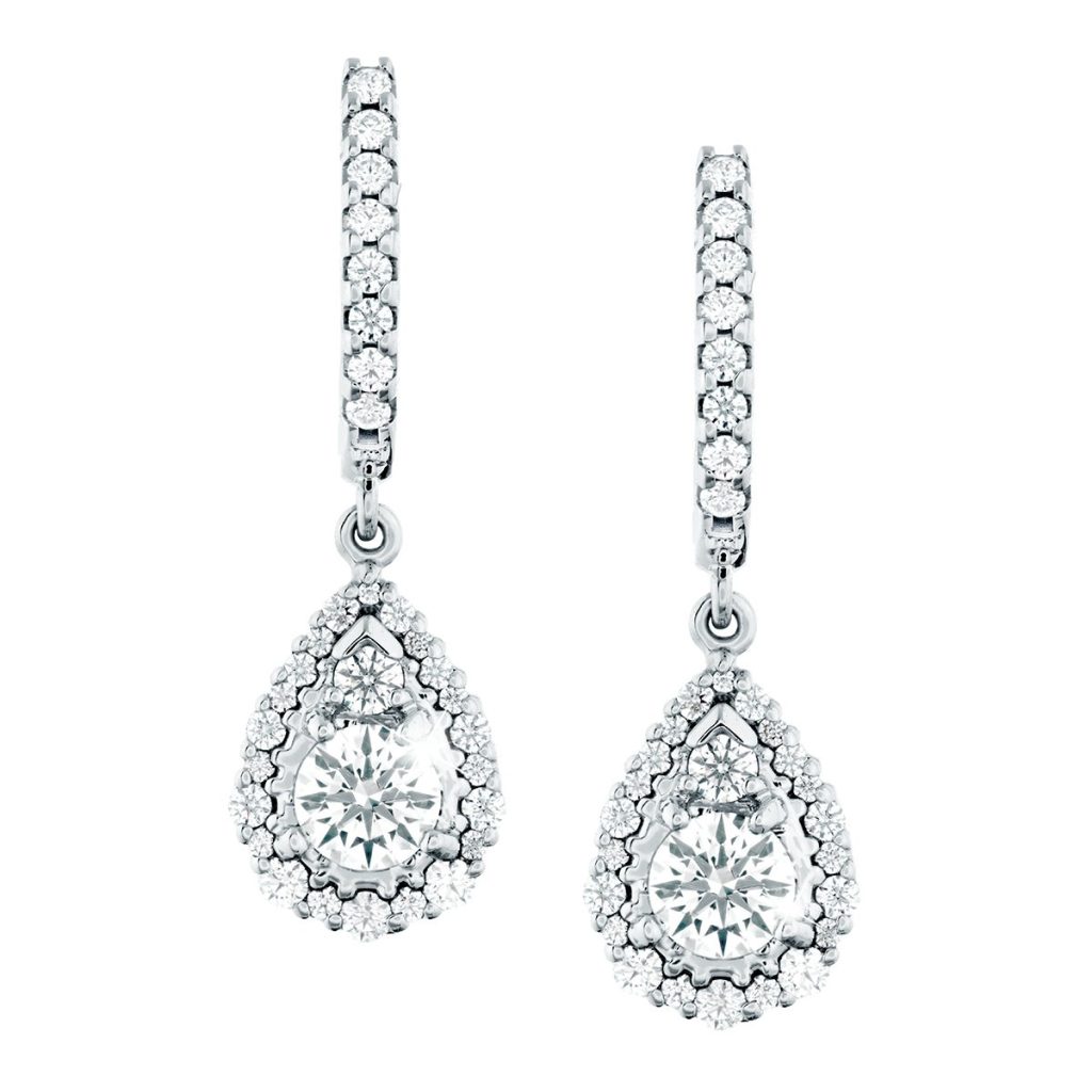 White gold diamond drop earrings with diamond haloes.