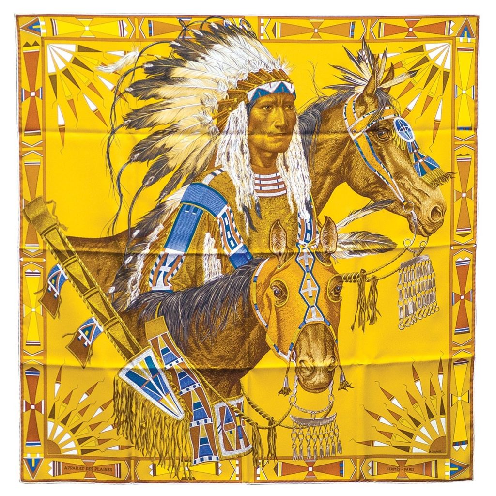 Vintage Hermès scarf in yellow with Native American Chief and horses in center.