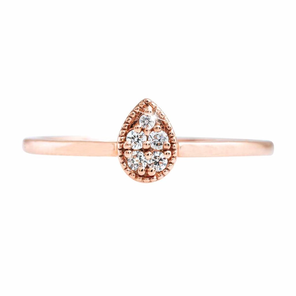 Rose gold cluster diamond engagement ring.