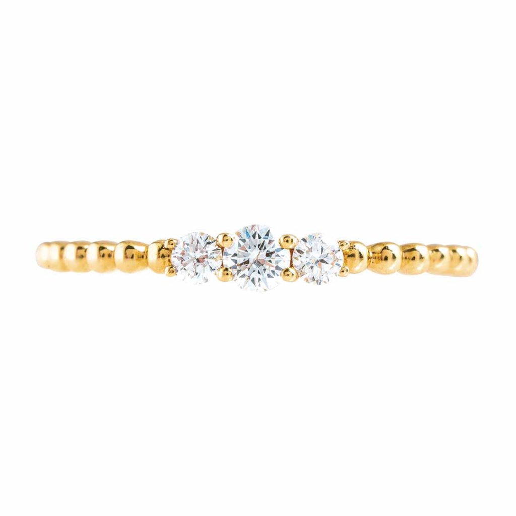 Vintage yellow gold Madison L three-stone diamond ring.