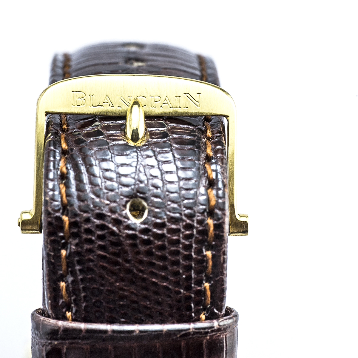 Close-up of pre-owned men’s Blancpain tang buckle.