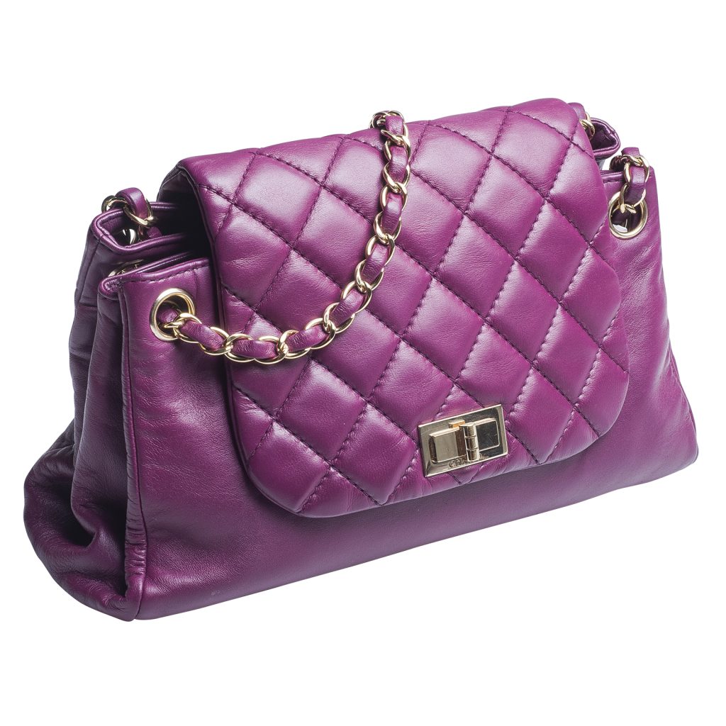 Vintage leather Chanel handbag in purple.