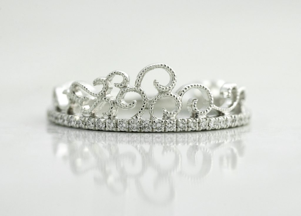 White gold filigree detail diamond eternity band.