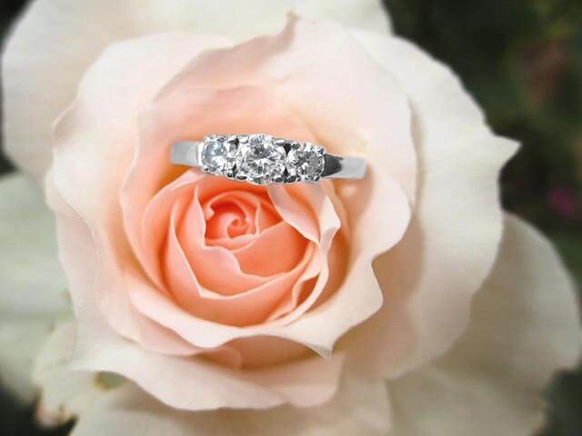 Ring in a rose bud - Do I have to buy a diamond engagement ring