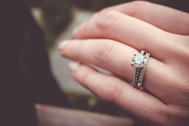 White gold diamond wedding set with diamonds in the bands.