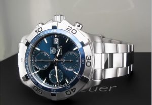 Pre-owned men’s TAG Heuer Aquaracer in stainless steel with a blue dial.