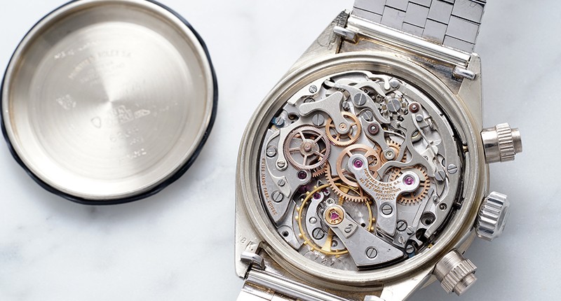 Inner gears and mechanisms of the pre-owned Rolex Cosmograph Daytona.