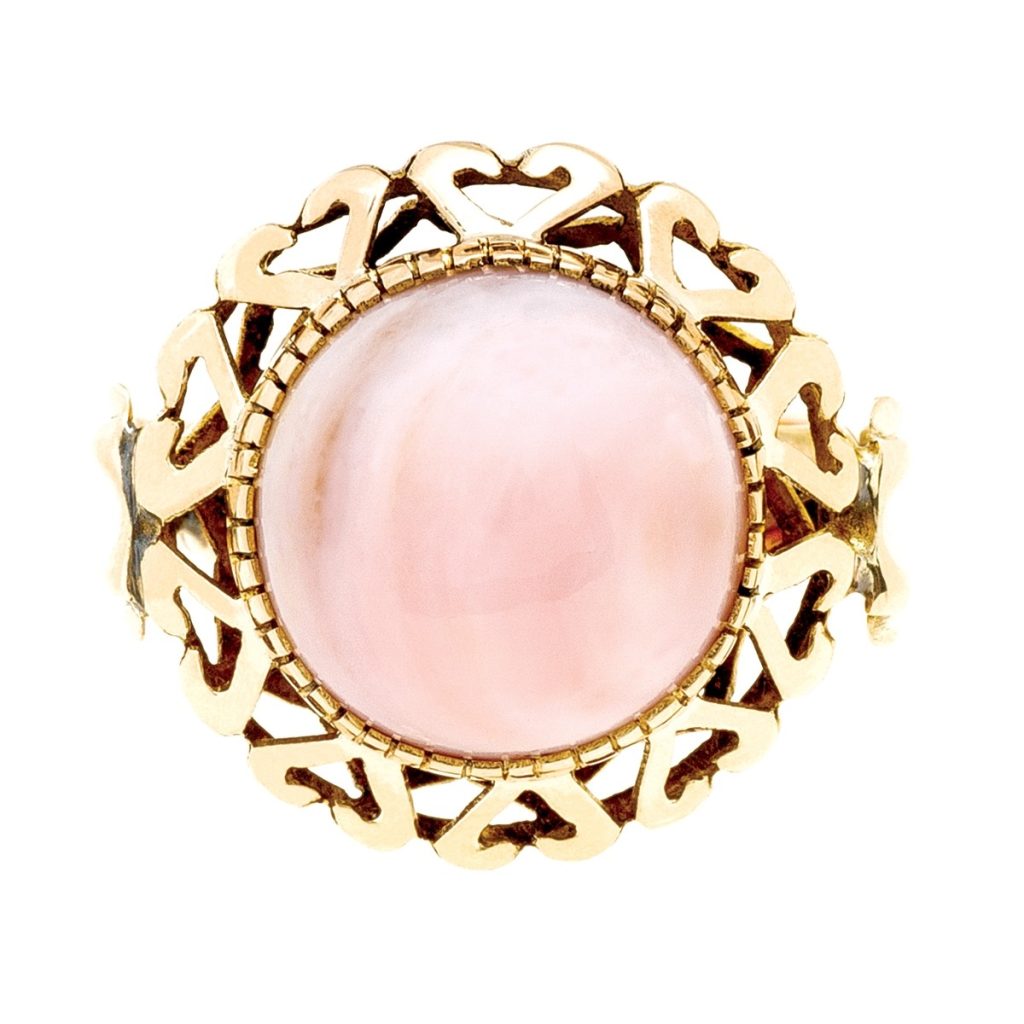 Yellow gold filigree cocktail ring set with coral.