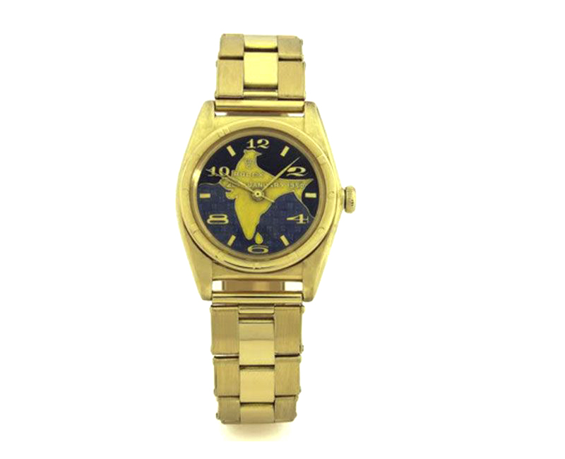 Pre-owned Rolex Oyster Perpetual in yellow gold with a map of India dial.