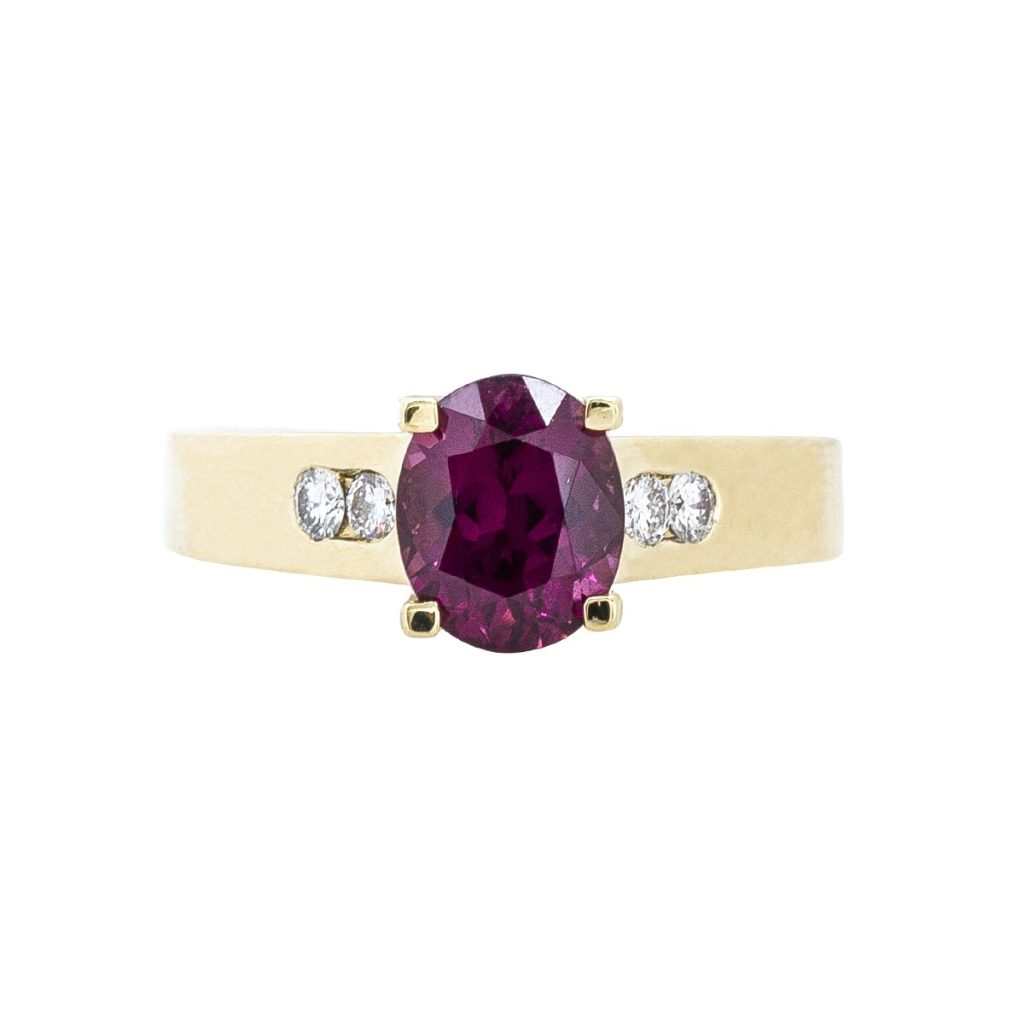 Garnet colored gemstone ring