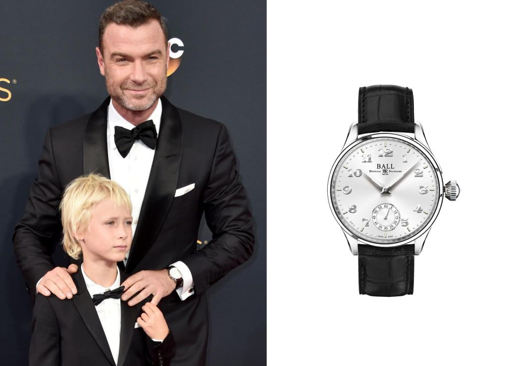 Celebrity wearing Ball Trainmaster Cleveland Night Express in stainless steel with awhite dial, sapphire crystal, black leather strap, and automatic movement.